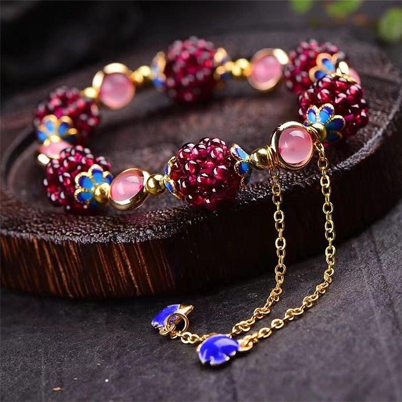 Grenade | Bracelet avec pierres rouges et roses – Vue 01