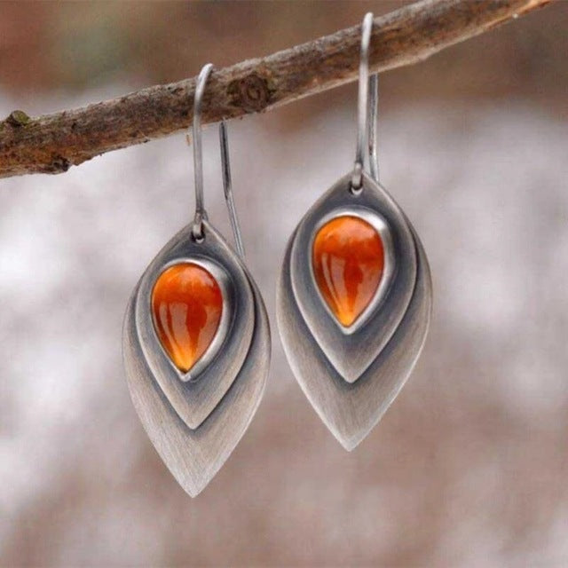 Goutte d'Ambre | Boucles d'oreilles argentées avec pierre orange – Vue 01