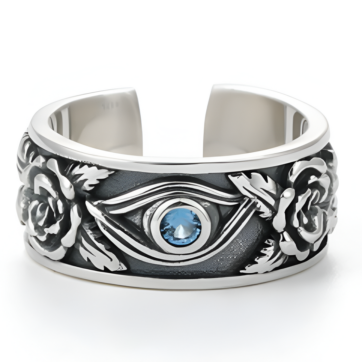Bague large argentée avec motif d'œil et pierre bleue ronde