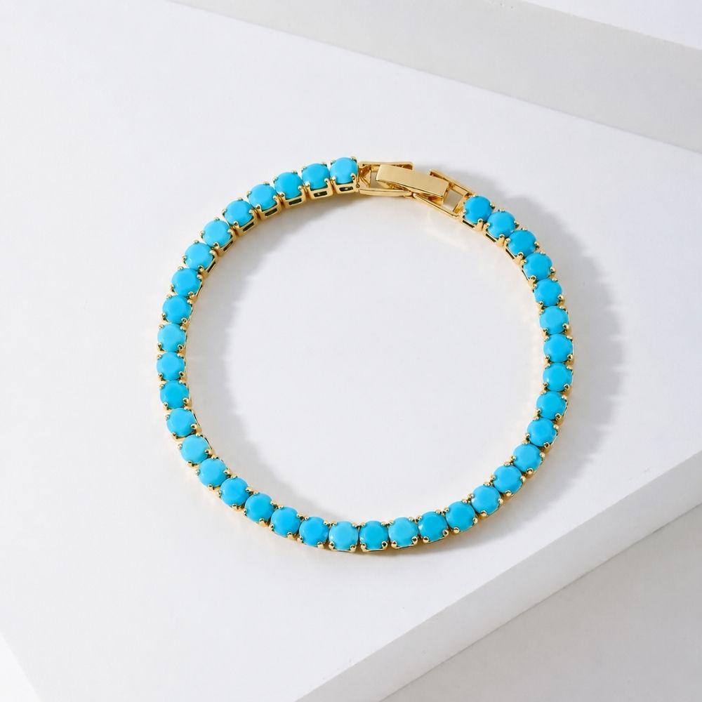 Rangée Serrée | Bracelet doré avec pierres turquoise – Vue 01