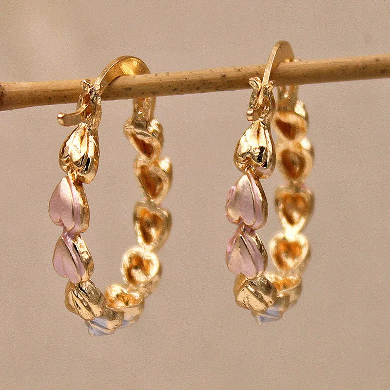 Lustre de Cœur | Créoles en or rose à l'allure de chaîne – Vue 01