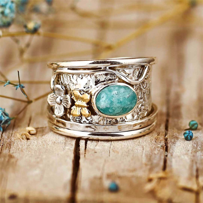 Reflet Marin | Bague argentée avec pierre turquoise et détails dorés – Vue 01