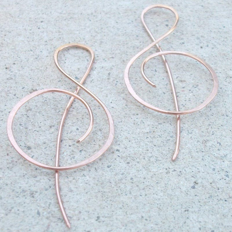 Note de Musique | Boucles d'oreilles en or rose à motif de clé de sol – Vue 01