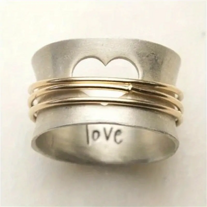 Anneau Cœur | Bague tournante large argentée avec découpe en cœur – Vue 01