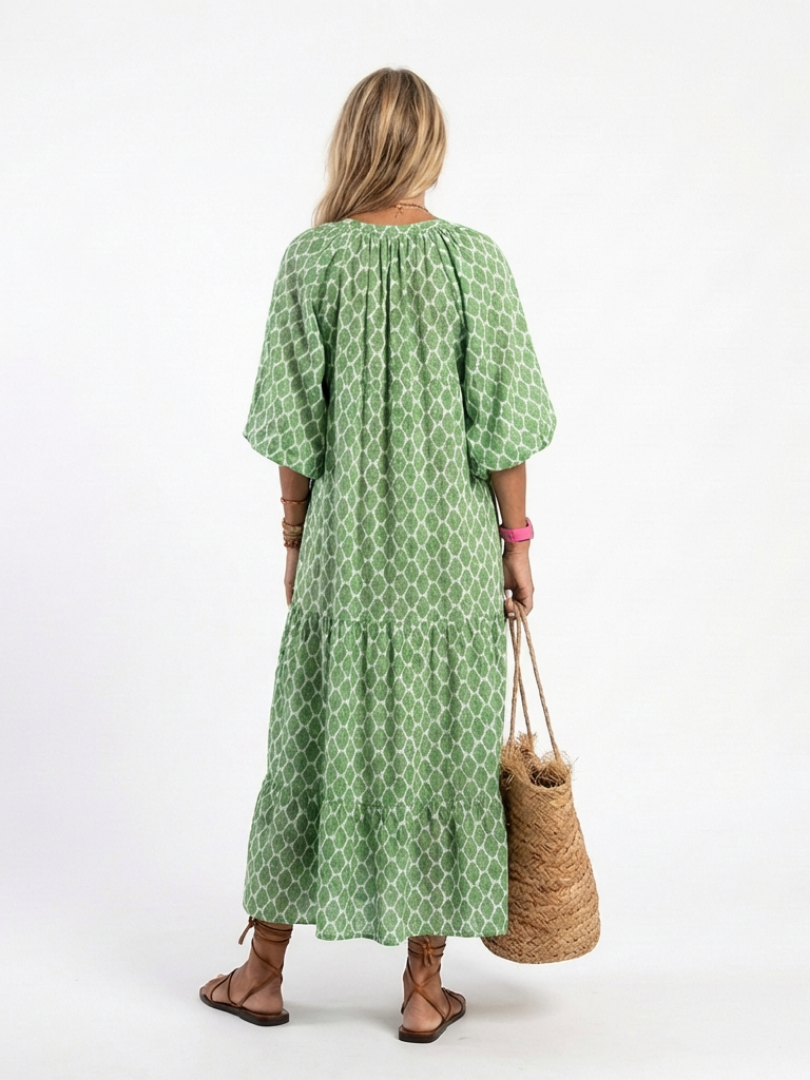 Amarante — Robe longue à volants et col V