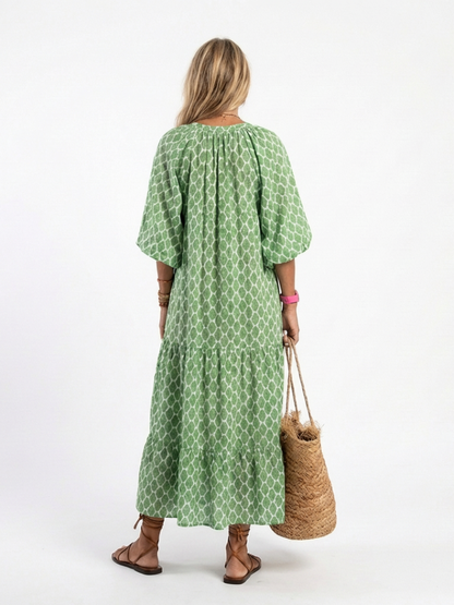 Amarante — Robe longue à volants et col V