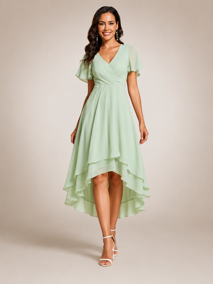 Roxane — Robe midi asymétrique à col V, coloris Vert amande