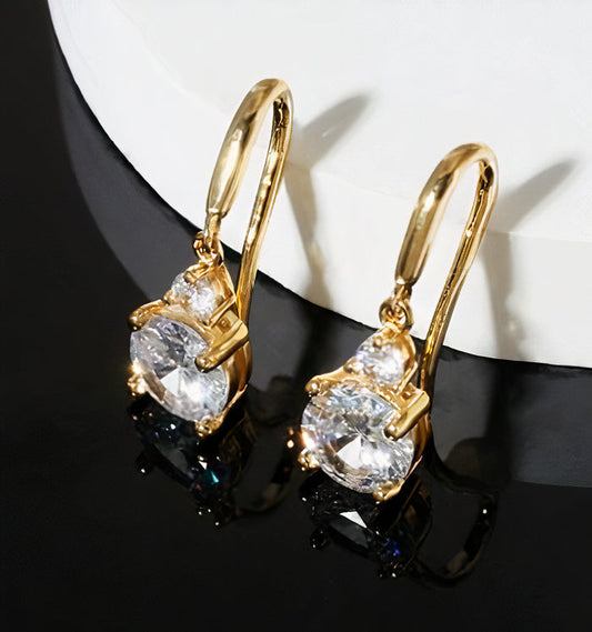 Rond Clair | Boucles d'oreilles dorées avec pierres claires rondes – Vue 01