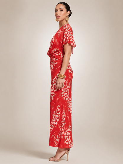 Calypso — Robe longue satinée à taille torsadée
