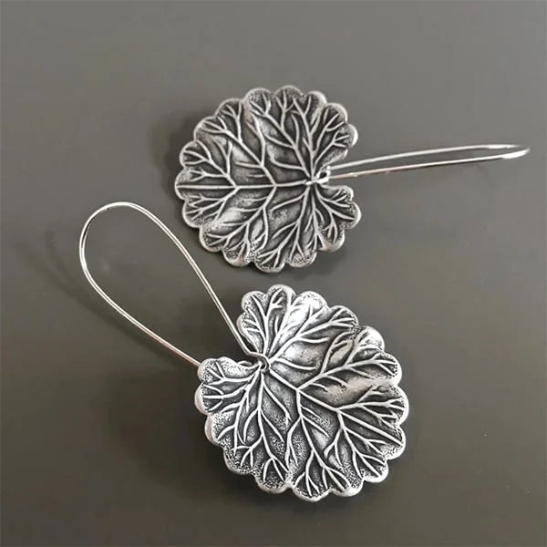 Disque Feuille | Boucles d'oreilles argentées en forme de feuilles – Vue 01