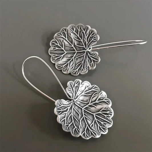 Disque Feuille | Boucles d'oreilles argentées en forme de feuilles – Vue 01