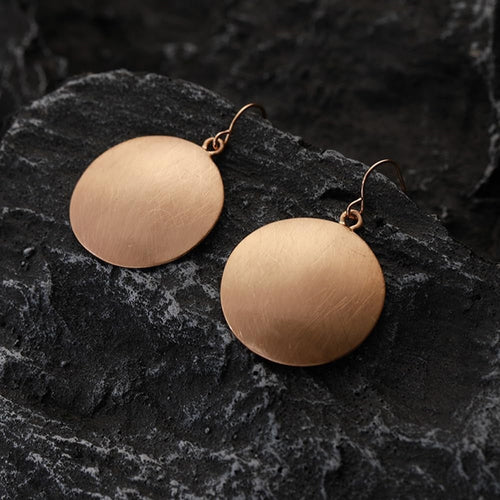 Surface Rose | Boucles d'oreilles rondes en or rose – Vue 01