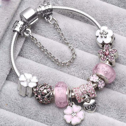 Charme de Rose | Bracelet à breloques argenté avec perles roses – Vue 01