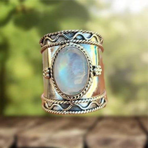 Surface Irisée | Bague large argentée avec grande pierre chatoyante – Vue 01