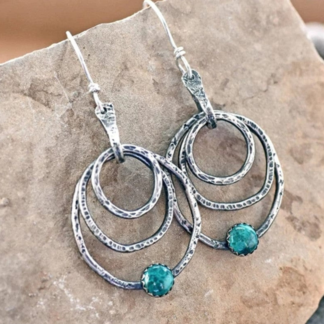 Anneau Spirale | Boucles d'oreilles argentées avec cercles et pierre turquoise – Vue 01