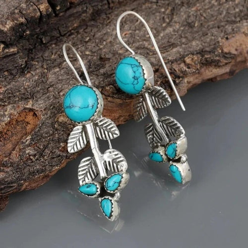 Rameau Feuillu | Boucles d'oreilles argentées avec pierres turquoise – Vue 01
