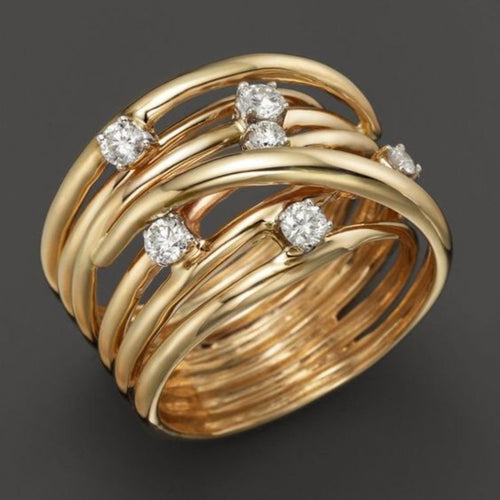 Couronne de Fils | Bague large dorée avec bandes torsadées et pierres claires – Vue 01
