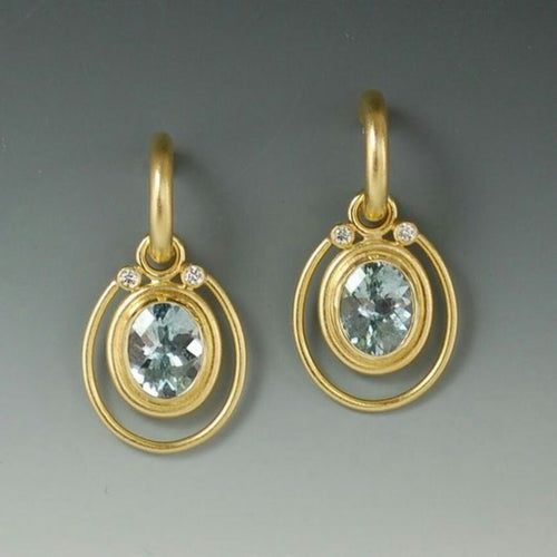Regard Aqua | Boucles d'oreilles dorées avec pierre bleu clair – Vue 01