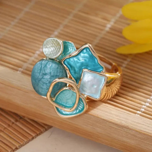 Éclat Marin | Bague dorée avec incrustations turquoise – Vue 01