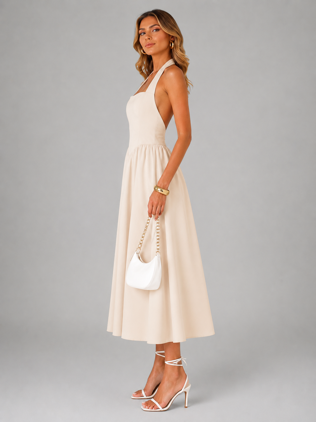 Célestine — Robe midi à col licou et jupe évasée