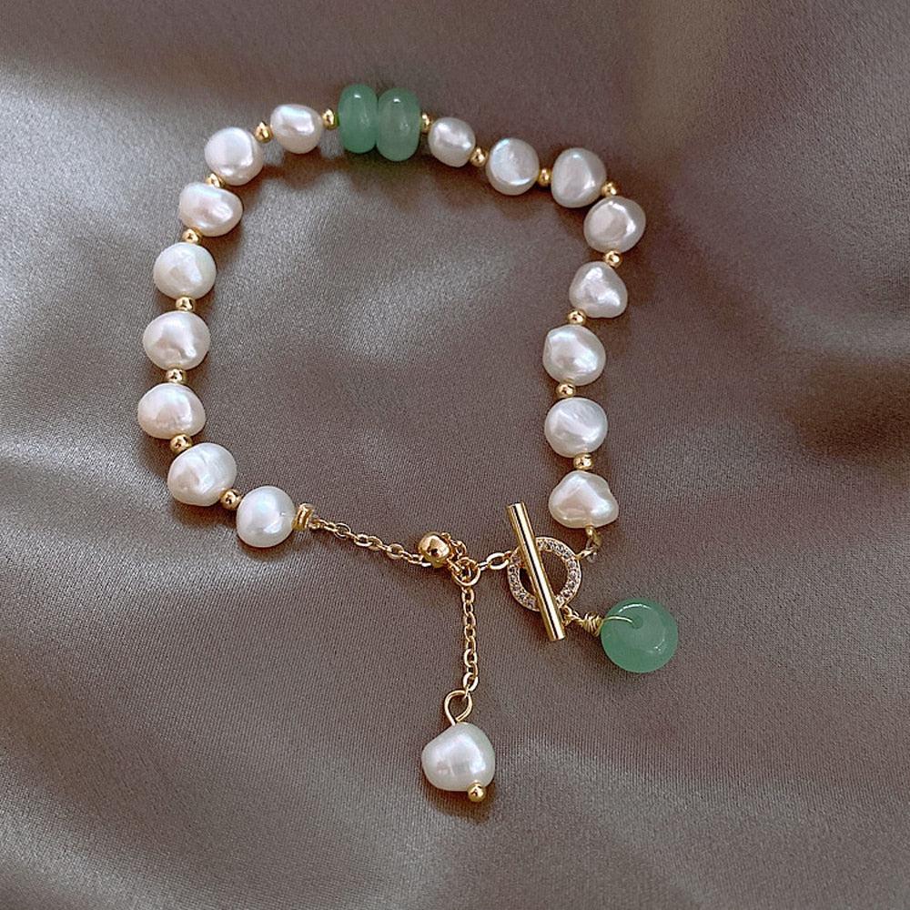 Estran | Bracelet avec détails blancs et pierres vertes – Vue 02