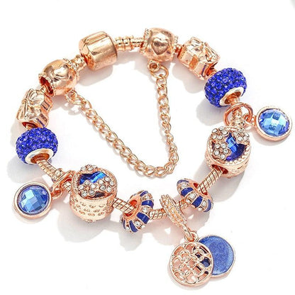 Ton Bleu | Bracelet à breloques or rose avec perles bleues – Vue 02