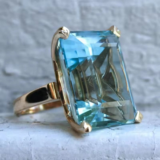 Lumière de Lagune | Bague dorée avec grande pierre bleu-vert – Vue 01