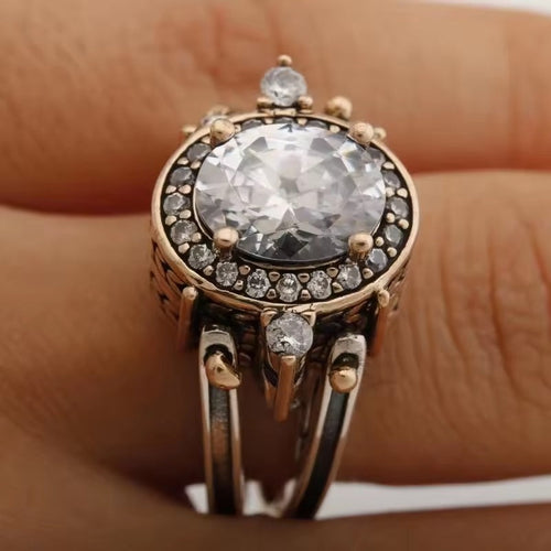 Éclat Ovale | Bague argentée et or rose avec pierre claire ovale – Vue 01