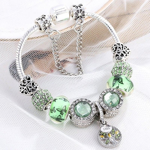 Charme Vert | Bracelet à breloques argenté avec perles vertes – Vue 01