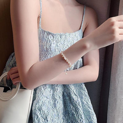 Célestine | Bracelet avec petits détails blancs irréguliers – Vue 06