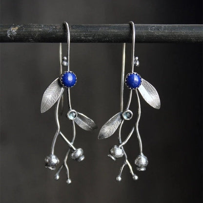 Branche Fleurie | Boucles d'oreilles argentées avec pierre bleue – Vue 01