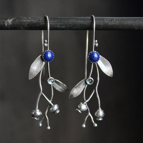 Branche Fleurie | Boucles d'oreilles argentées avec pierre bleue – Vue 01