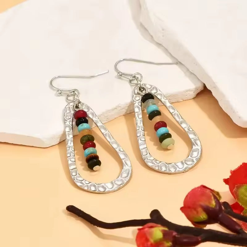 Échelle Perlée | Boucles d'oreilles gouttes ouvertes avec perles colorées – Vue 01