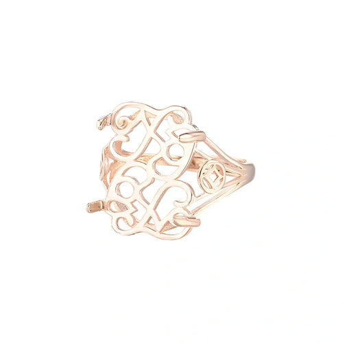 Bague en or rose à motif ajouré d'arcs