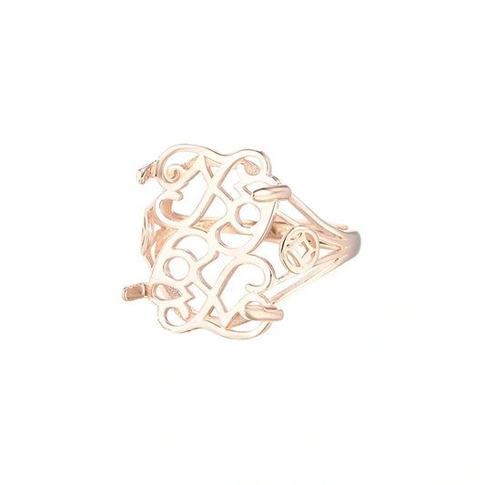 Bague en or rose à motif ajouré d'arcs