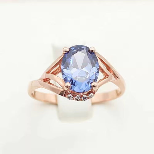 Brume Bleue | Bague en or rose avec pierre bleue ovale – Vue 01