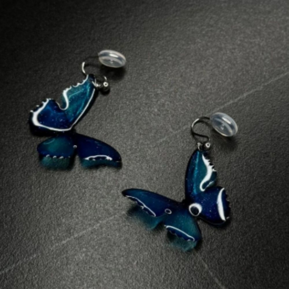 Papillon | Boucles d'oreilles avec ailes en émail bleu – Vue 01