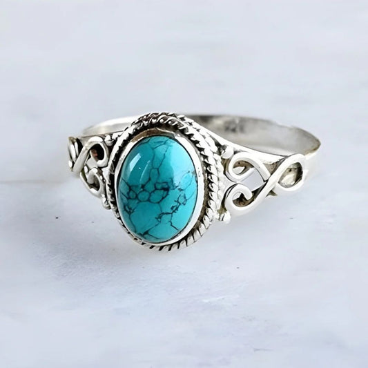 Œil Marin | Bague argentée avec pierre turquoise ovale – Vue 01