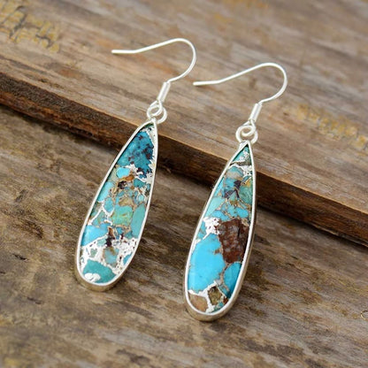Goutte à Motifs | Boucles d'oreilles argentées avec pierres turquoise – Vue 01