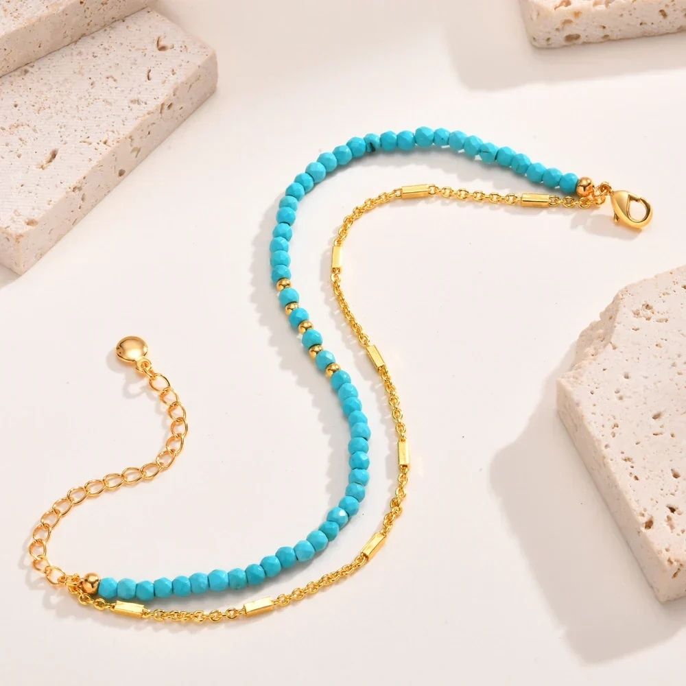 Double Chaîne | Bracelet double doré avec perles turquoise – Vue 02