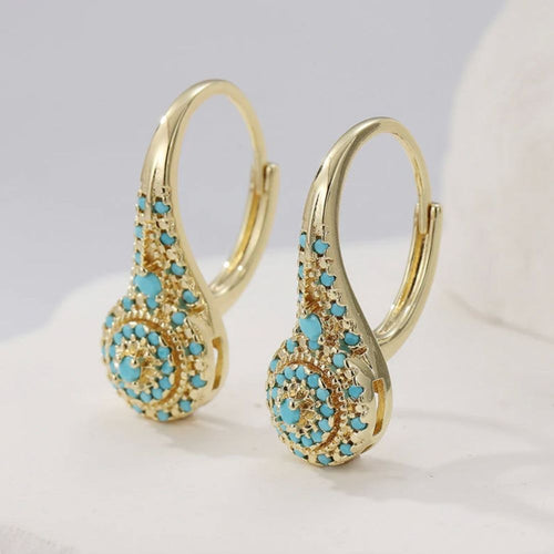 Rosace de Gouttes | Boucles d'oreilles gouttes dorées avec pierres turquoise – Vue 01