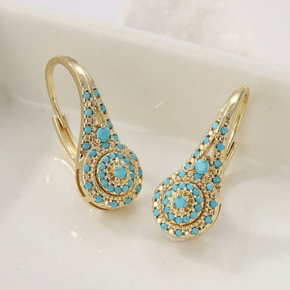 Rosace de Gouttes | Boucles d'oreilles gouttes dorées avec pierres turquoise – Vue 02