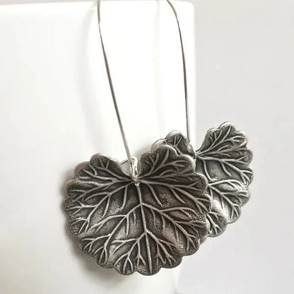 Disque Feuille | Boucles d'oreilles argentées en forme de feuilles – Vue 03