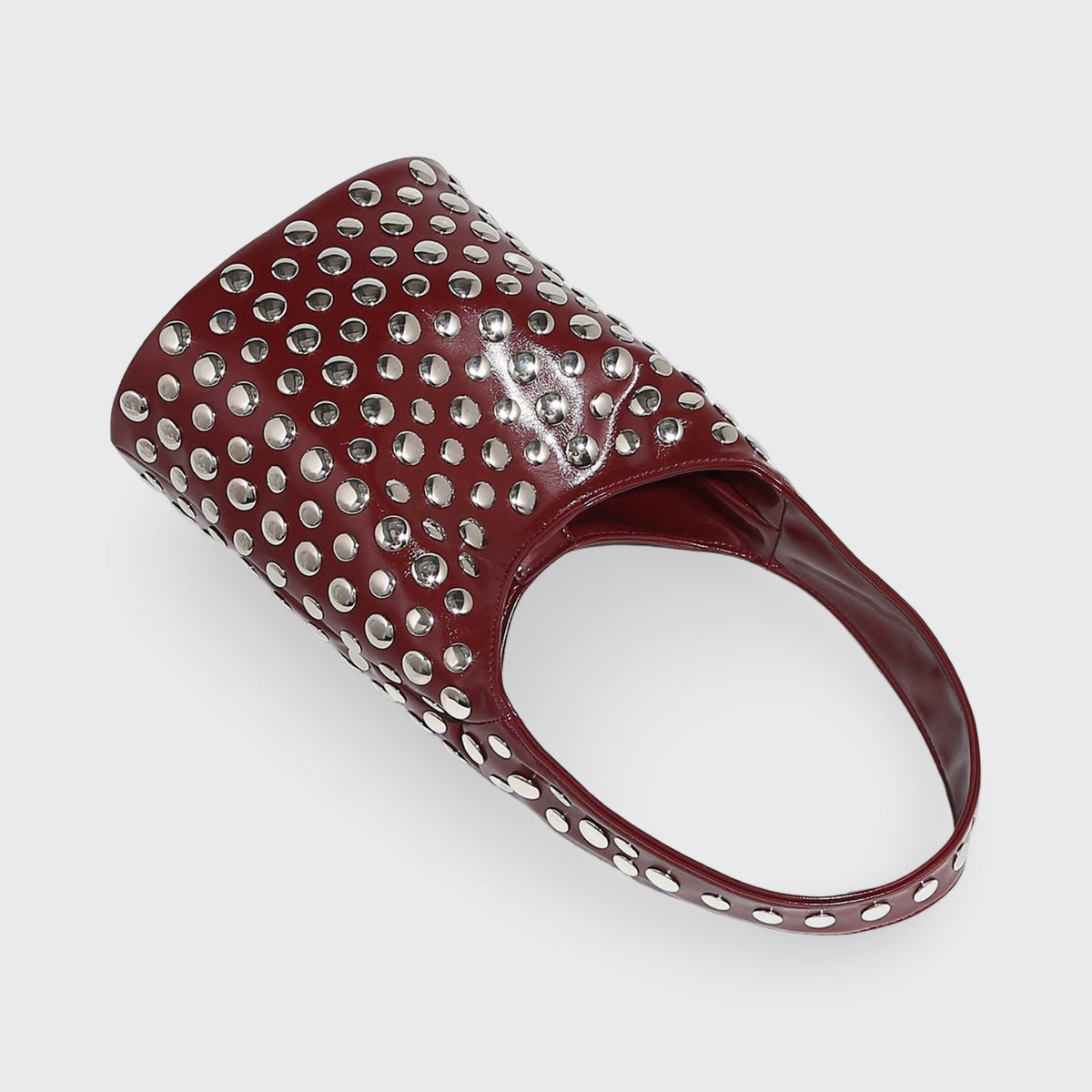 Sac seau Crissy bordeaux porté à l'épaule