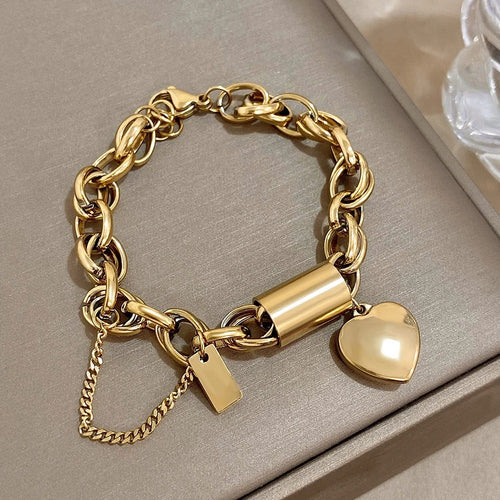 Cadenas Cœur | Bracelet chaîne épais avec pendentif cœur et chaînette de sécurité – Vue 01