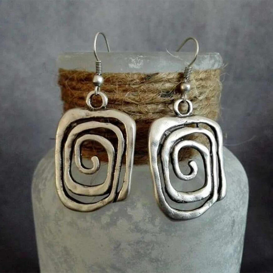Surface Spirale | Boucles d'oreilles à motif de spirale en deux tons de métal – Vue 01