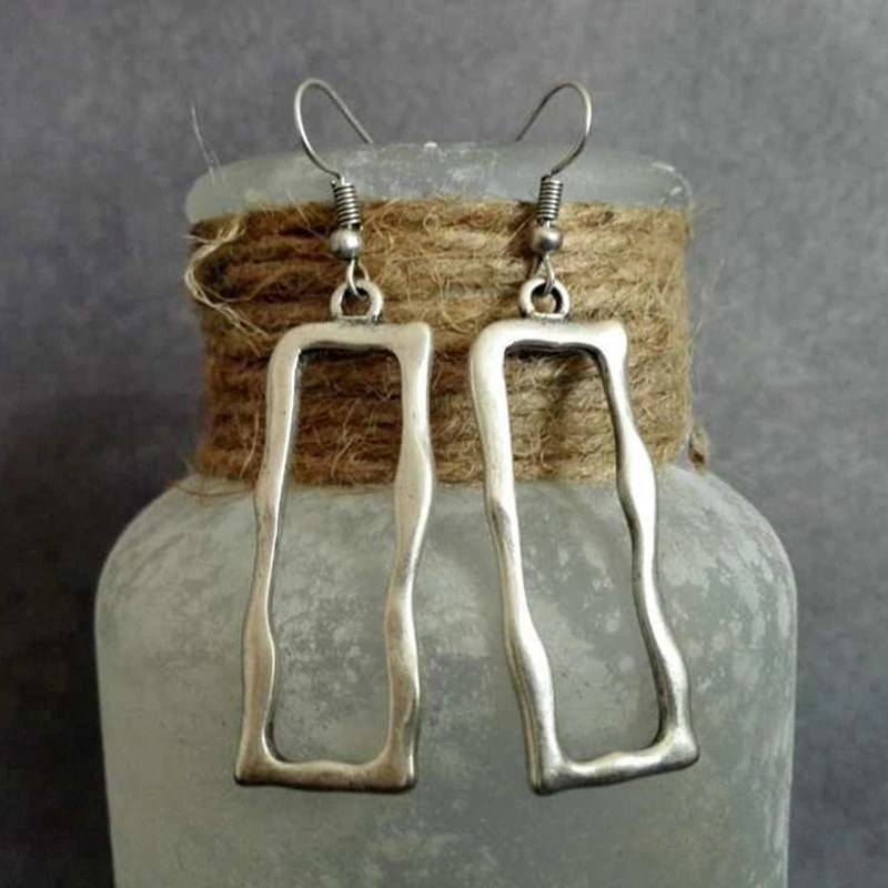 Jeu de Cadres | Boucles d'oreilles argentées avec rectangle ouvert – Vue 01