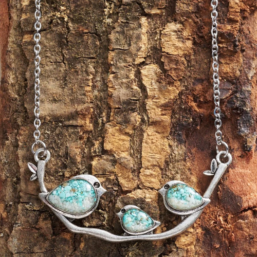 Oiseau | Collier argenté au motif d'oiseau – Vue 01