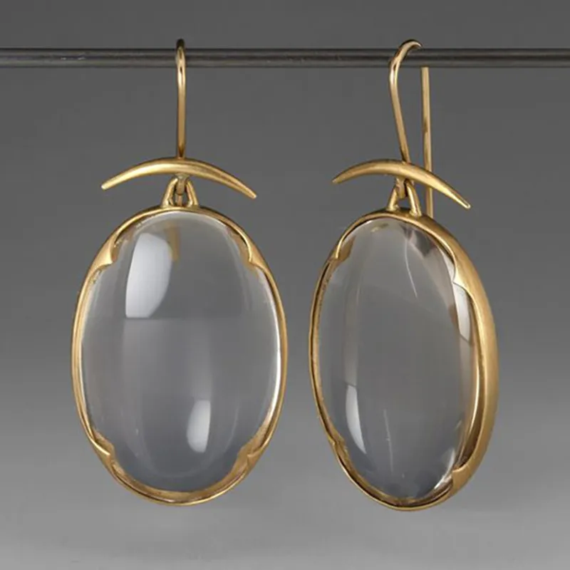 Pierre Claire | Boucles d'oreilles dorées avec grande pierre claire – Vue 01