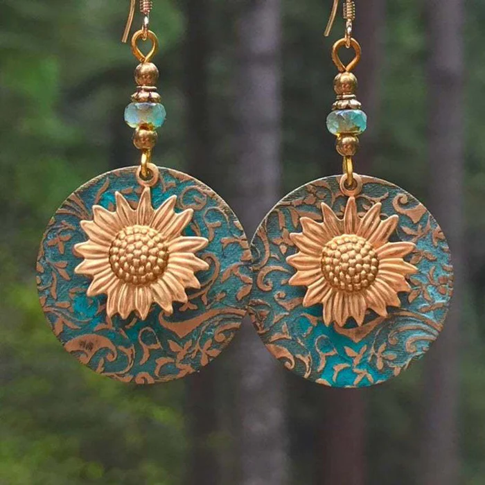 Tournesol | Boucles d'oreilles avec tournesol sur fond turquoise – Vue 01